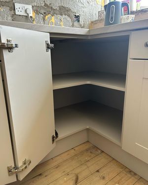 corner-kitchen-cupboard-with-doors-open.jpg